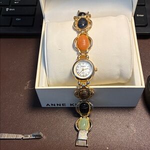 Anne Klein Gold Watch with Colorful Stones